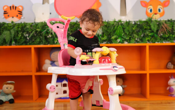PINK BABY WALKER WITH SUN SHIELD - Image 4